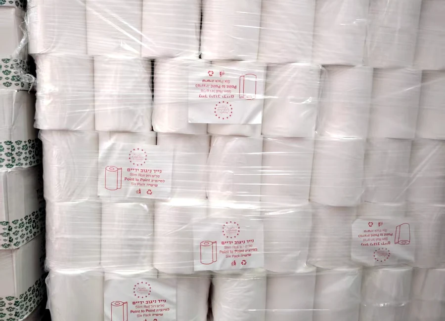 PE examination rolls wrapped and packed for shipment