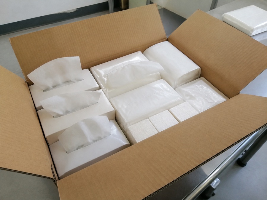 Facial tissue pack formats arranged for carton-space comparison
