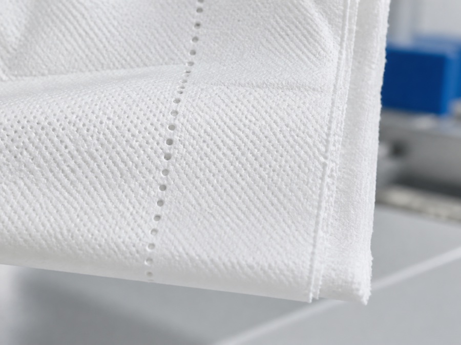 kitchen paper towel manufacturer — macro close-up of realistic kitchen towel perforation ties embossing and clean torn