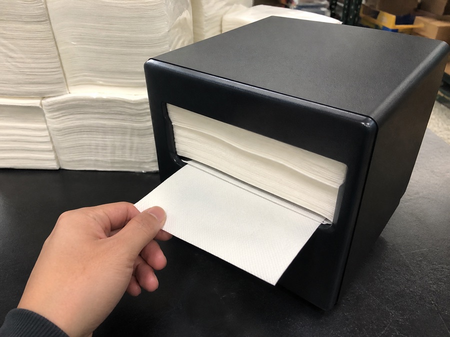 Interfold paper napkin stack tested in an unbranded dispenser
