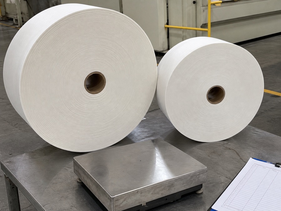 Two tissue mother rolls compared by usable paper and roll construction