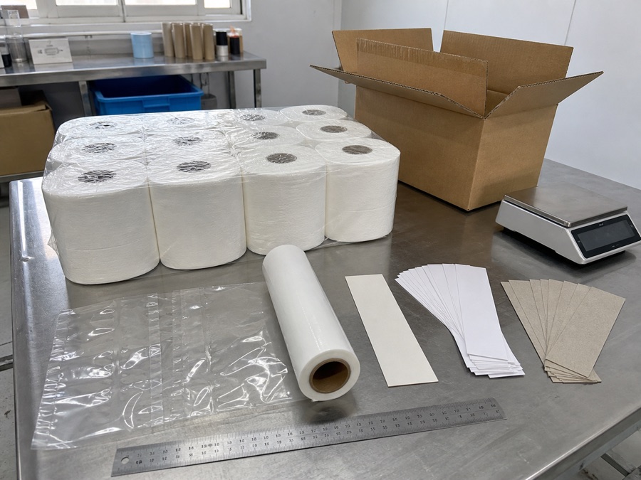 Tissue packaging components arranged for weight and dimension records