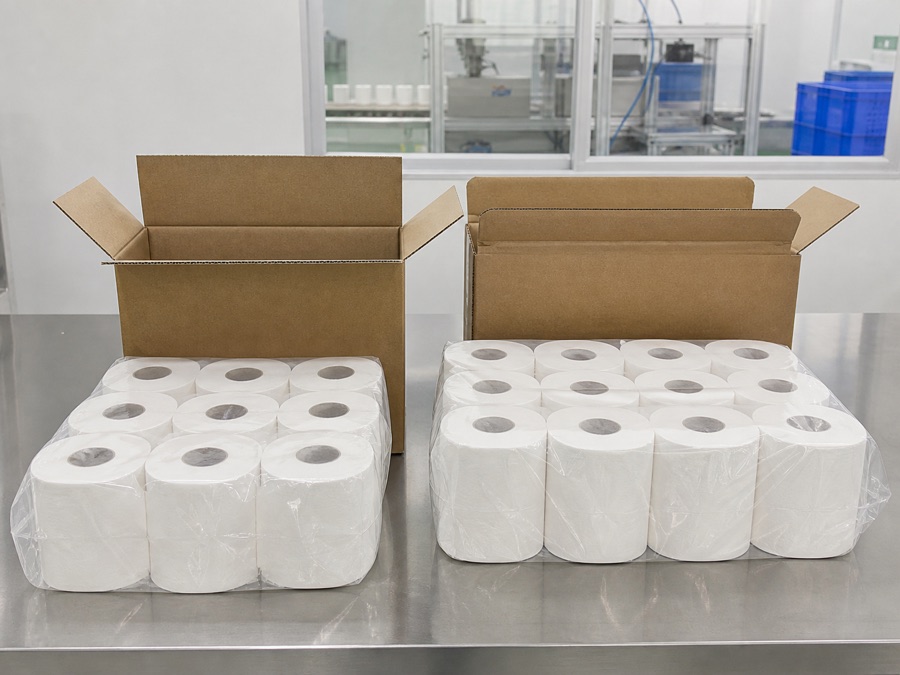 Two tissue packing formats compared for material use and carton space