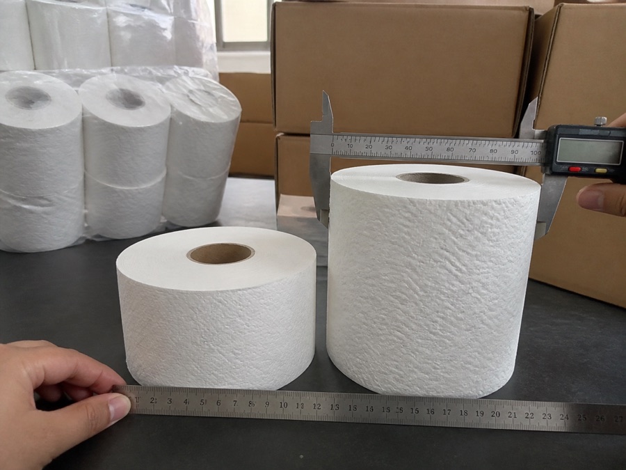 Two toilet paper roll diameters measured before pack design