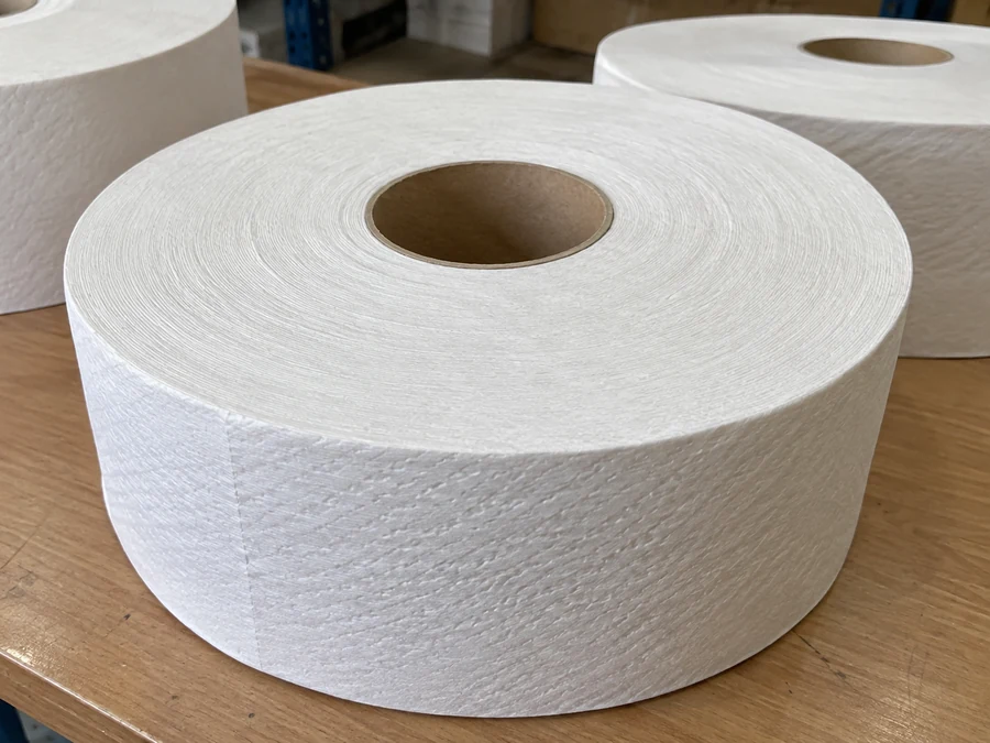 Close view of a commercial toilet roll and its cardboard core